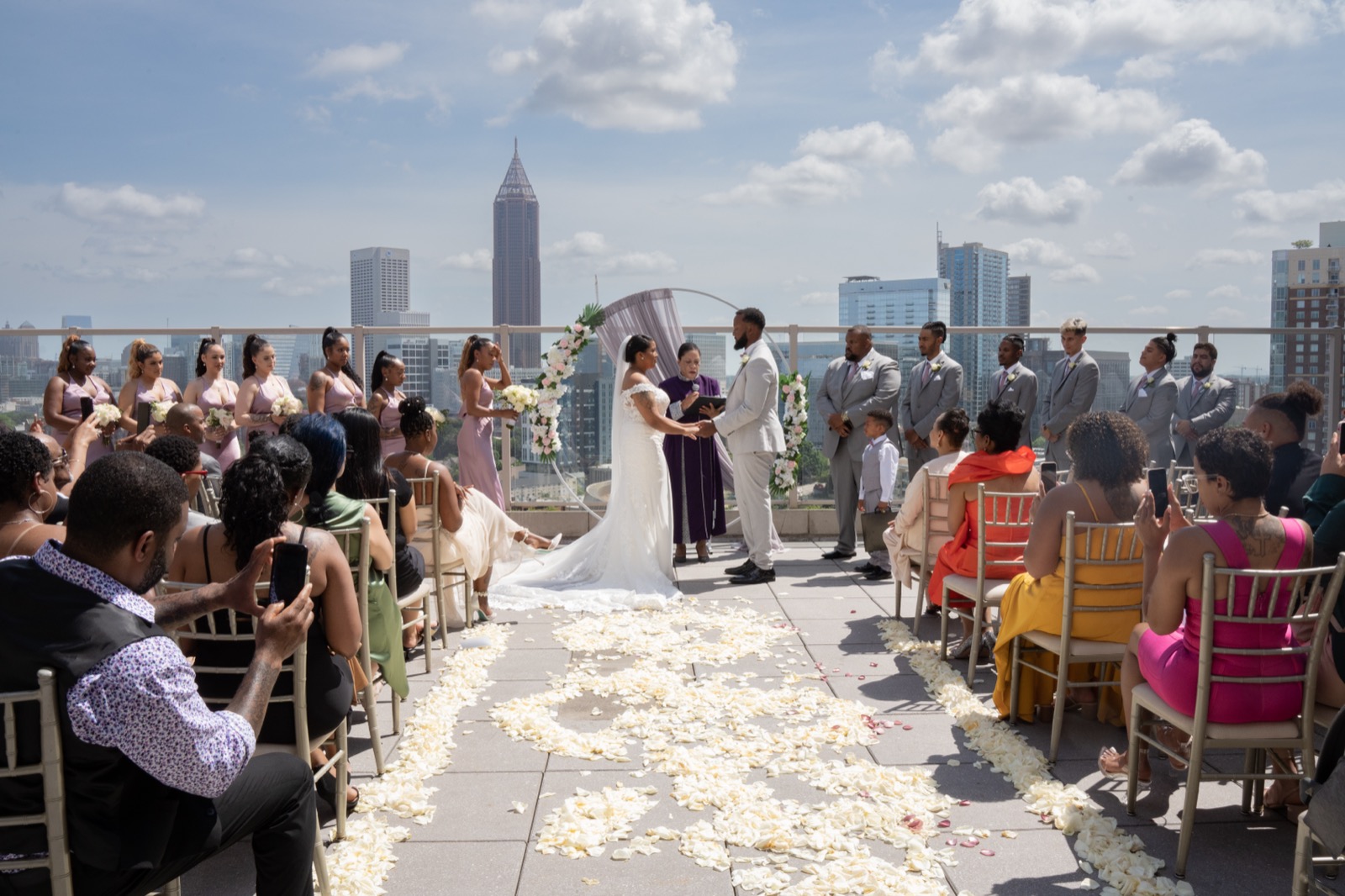 Rooftop wedding ceremony with Atlanta skyline — 2KNOT1 wedding photography